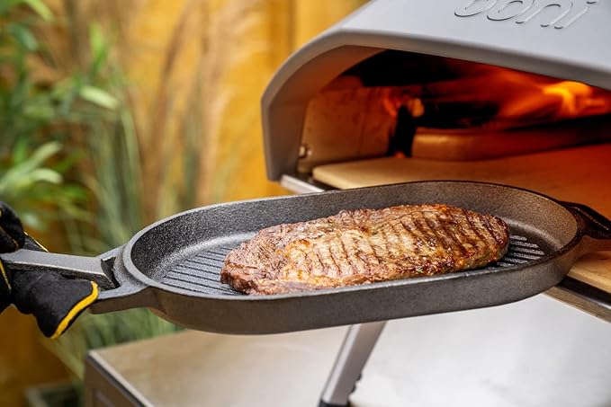 ooni Cast Iron Grizzler Pan - Grill Frying Pan, 12" x 6" Griddle Plate with Removable Handle and Stainless Steel Trivet, Pre-Seasoned Non-Stick Oven Safe Cookware, Pizza Oven and BBQ Accessories