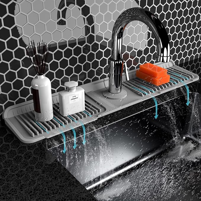 Folding sink splash guard behind faucet-faucet mat by Unknown