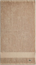 Lacoste Heritage 100% Supima Cotton Hand Towel 16" x 30", Sand | Highly by Unknown